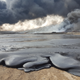 Solidified flows of crude oil, spilled when ISIS attacked the Qayarrah oil field, were still pooled across the landscape when Wim Zwijnenburg visited the area in January 2017.